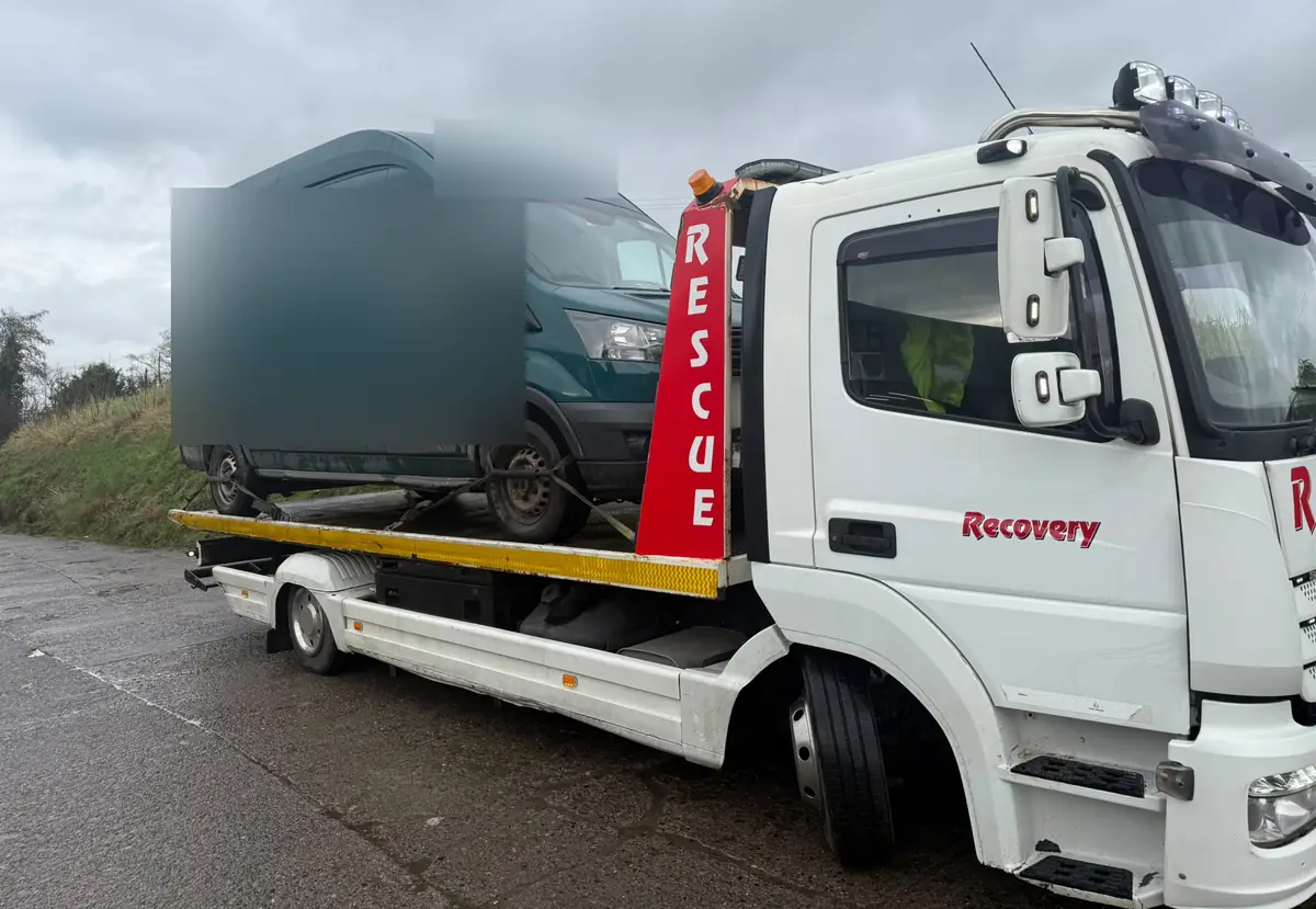 Recovery CC tow truck with RESCUE post carrying a large high-roof van, van towing in Dublin